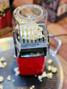 Here is a concise, high-impact short description for your WordPress product page. This is ideal for the "Product Short Description" field (usually found next to the product image). Meixi A-209 Mini Popcorn Machine Enjoy guilt-free, movie-style popcorn in minutes with the Meixi A-209. This compact 1200W hot air popper eliminates the need for oil, delivering a healthy, low-calorie snack with a 98% popping efficiency. Fast Results: Fresh popcorn in just 2.5 to 3 minutes. Healthy Snacking: 100% oil-free hot air technology. Compact Design: Perfect for small kitchens, dorms, or offices. Easy Cleanup: Removable lid and measuring cup for quick maintenance. Bonus Feature: Includes a built-in measuring cup that doubles as a butter melting tray.